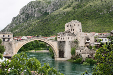 Fototapeta na wymiar Old Mostar bridge over the Neretva river in Bosnia, Europe