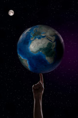 Planet earth, used as a ball to play. Let's not play with the earth
