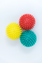 photos of massage balls of different colors. Association with coronavirus. concept. adaptation mutation and variability. Vertically