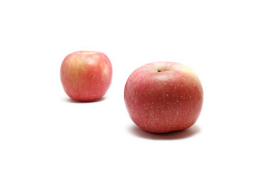 Two apples isolated on white background, perfect for breakfasting during ramadan