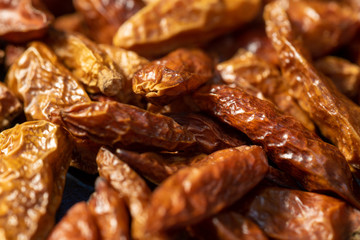 Detail of dried cayenne to add spice to food. Blue dark background