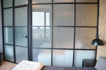 Frosted glass bedroom wall, glass room divider, partition with squares is a perfect solution for small spaces.