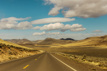 A Lonely Long Road with a Stunning Scenic Landscape View