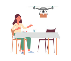 Woman receiving package from delivery drone at home behind dining table