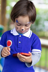 Lovely Boy Playing on Mobile Phone