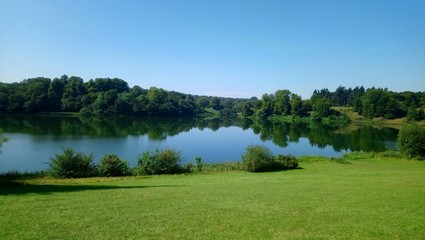 landscape with lake. Azure blue waters. Crisp blue skies. Beautiful panoramic views.