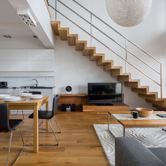 Two-floor apartment with wooden details