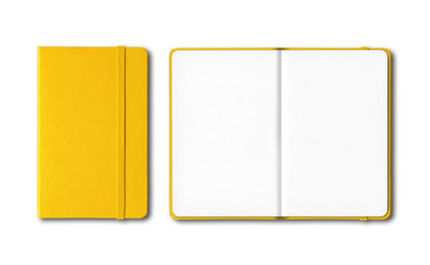 Yellow closed and open notebooks isolated on white - obrazy, fototapety, plakaty
