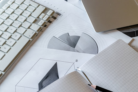 Statistical analysis process control. Finance diagrams and graphs in office table. Financial analytics workspace. Planner and Agenda Concept. - Powered by Adobe