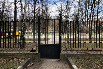 Closed door in fence due to quarantine and work ban