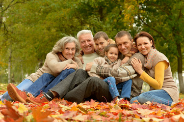 Fototapeta premium Big family having fun together in autumnal park
