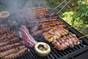 Grilling meat in smoke