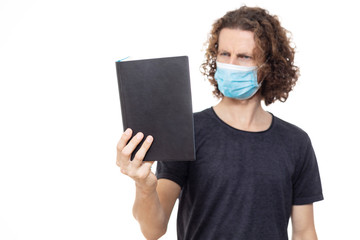 Student in medical mask. Pandemic coronavirus epidemic covid-19 quarantine isolated white book