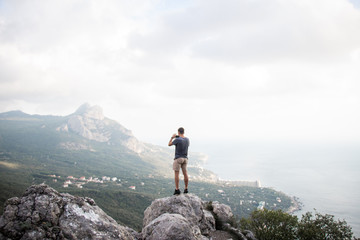 A chic view and a man on the edge of a cliff-Crimea