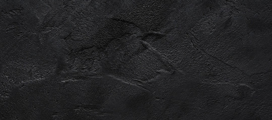 Monochrome black wall texture rough background dark. Concrete floor or old grunge background with black.