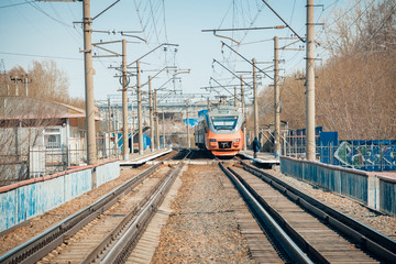 Fototapeta na wymiar Train in an empty train station railways rails