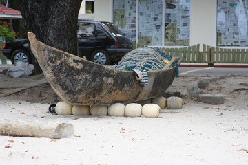 Seychelles traditional boat on the beach