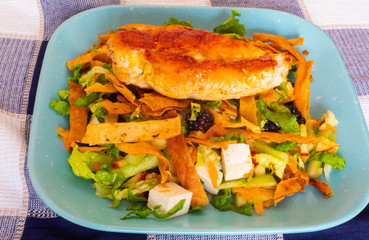 delicious plate of chicken salad with different vegetables and fruits, to start healthy diets