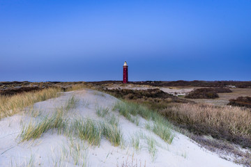 Lighthouse Ouddorp, Goeree Overflakkee, Summer evening on the beach.