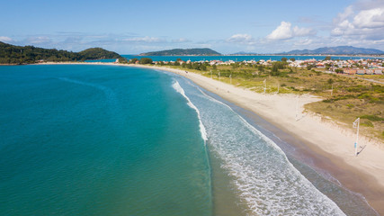 Fototapeta na wymiar Aerial view of Sonho beach, in Palhoça. Beautiful beach in Santa Catarina, Brazil