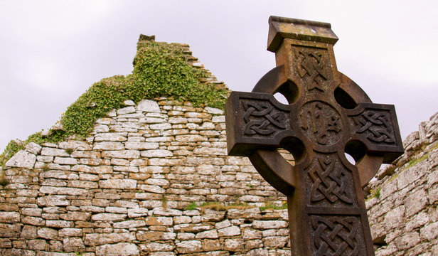 Celtic cross in an Irish cemetery church ruins
