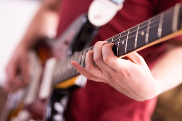 Playing chords on the guitar