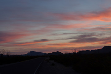 Sunset in the desert with mountains