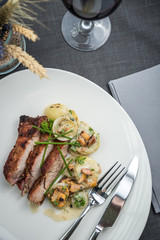 Pork roast meat with mushroom sauce, potatoes