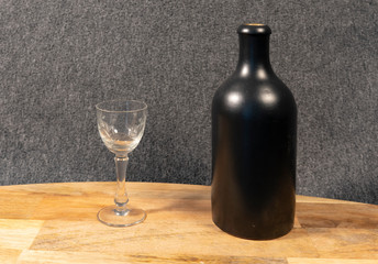 Still life with bottle and glass