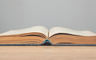 Open book on a wooden table