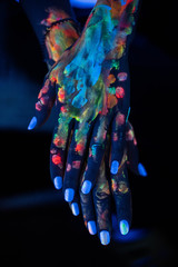 photo hands in neon paint