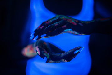 photo hands in neon paint