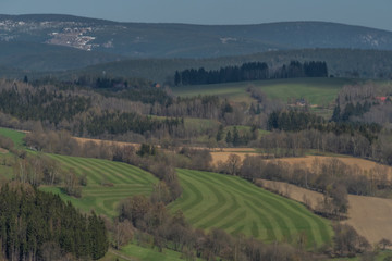 Meadows near Krkonose mountains in spring nice day