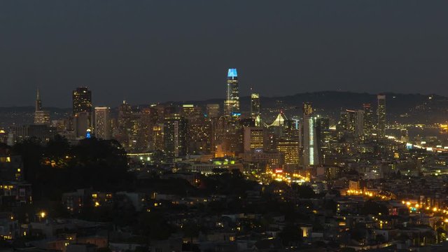San Francisco, California, USA - August 2019: San Francisco downtown cityscape from sunset to night time lapse