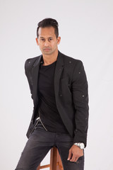 Fototapeta premium Handsome man in black shirt and suit jacket