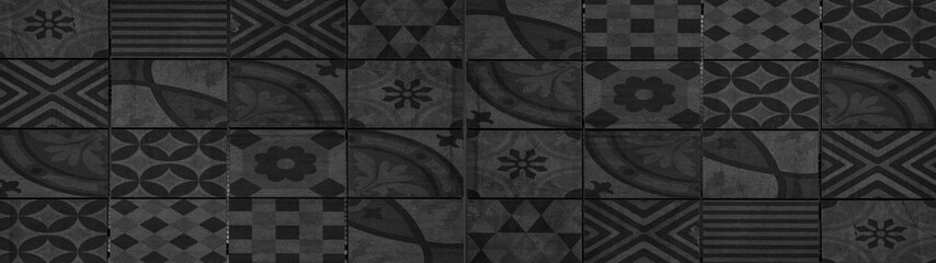 Black anthracite dark vintage retro geometric square mosaic motif cement tiles texture background banner panorama 