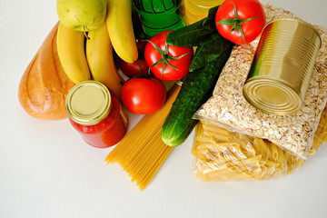 Food supplies crisis food stock for quarantine isolation period on white background. Food delivery, Donation, coronavirus quarantine. Copyspace.