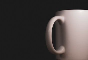 cup of coffee on black background