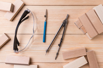 Safety glasses, drawing accessories and wooden blocks