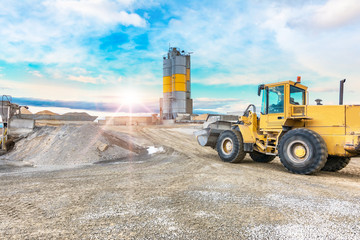 Obraz premium Quarry for the extraction of sand and stone, its transformation into gravel and cement manufacturing