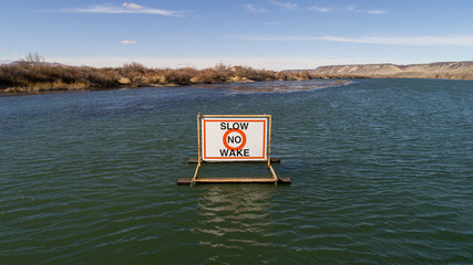 Sign telling people to produce no wake