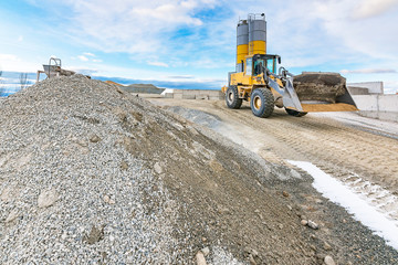 Obraz premium Quarry for the extraction of sand and stone, its transformation into gravel and cement manufacturing