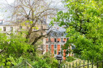 Paris, Montmartre, typical buildings and staircase, romantic view
