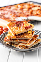 Pieces of homemade Italian pizza.