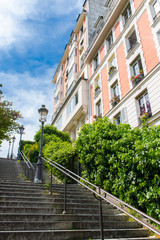 Paris, Montmartre, typical buildings and staircase, romantic view
