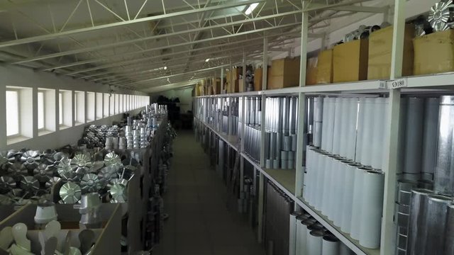 Factory warehouse spare parts. Storage and distribution of components.