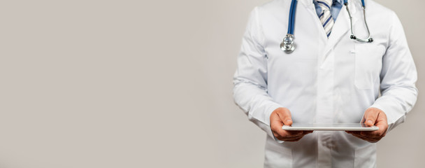 Doctor using a tablet and check with the analysis of the DNA chromosome of a genetic person on a...
