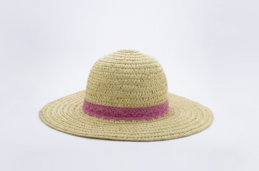 Womens summer yellow straw hat with the ribbon, isolated on white background.