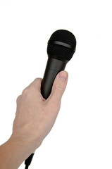 Microphone in hand Isolated on a white background. Microphone in a male hand.