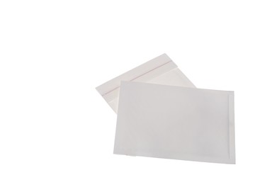 Close up view of empty white envelopes isolated. Packaging concept. 